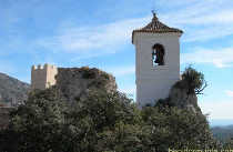 Guadalest Bell Tower and Alcozaiba Castle in the background