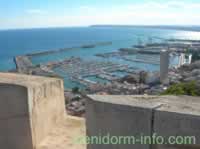 Marina & Port viewed through a canon port of Santa Barbara Castle